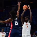 arafan diane shooting over a team USA defender
