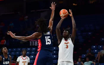 arafan diane shooting over a team USA defender